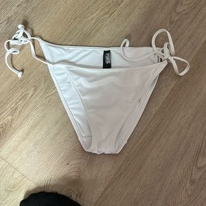 white swimsuit bottoms tie